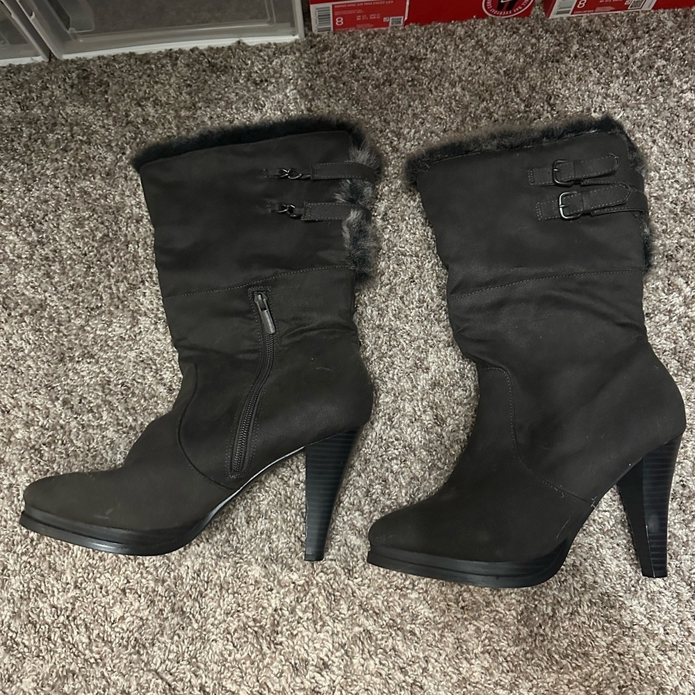 Faux dark gray heeled boots.